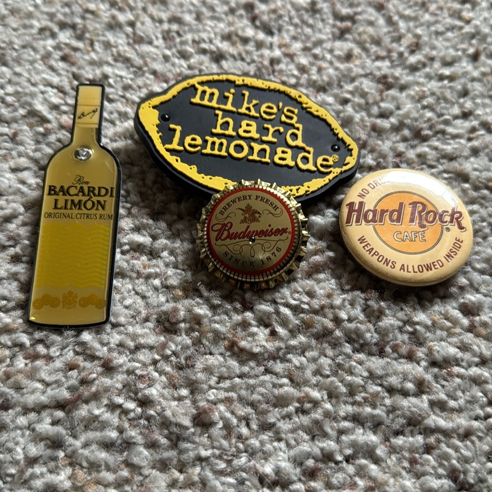 Set of 4 collectible bar pins. Bacardi Limon, Mikes Hard Lemonade, Budweiser etc